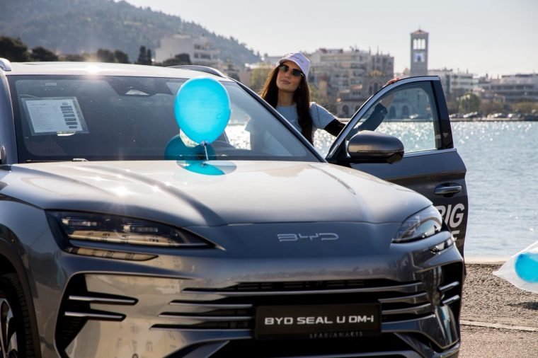 A BYD outdoor activation by the sea, with branded dressing.