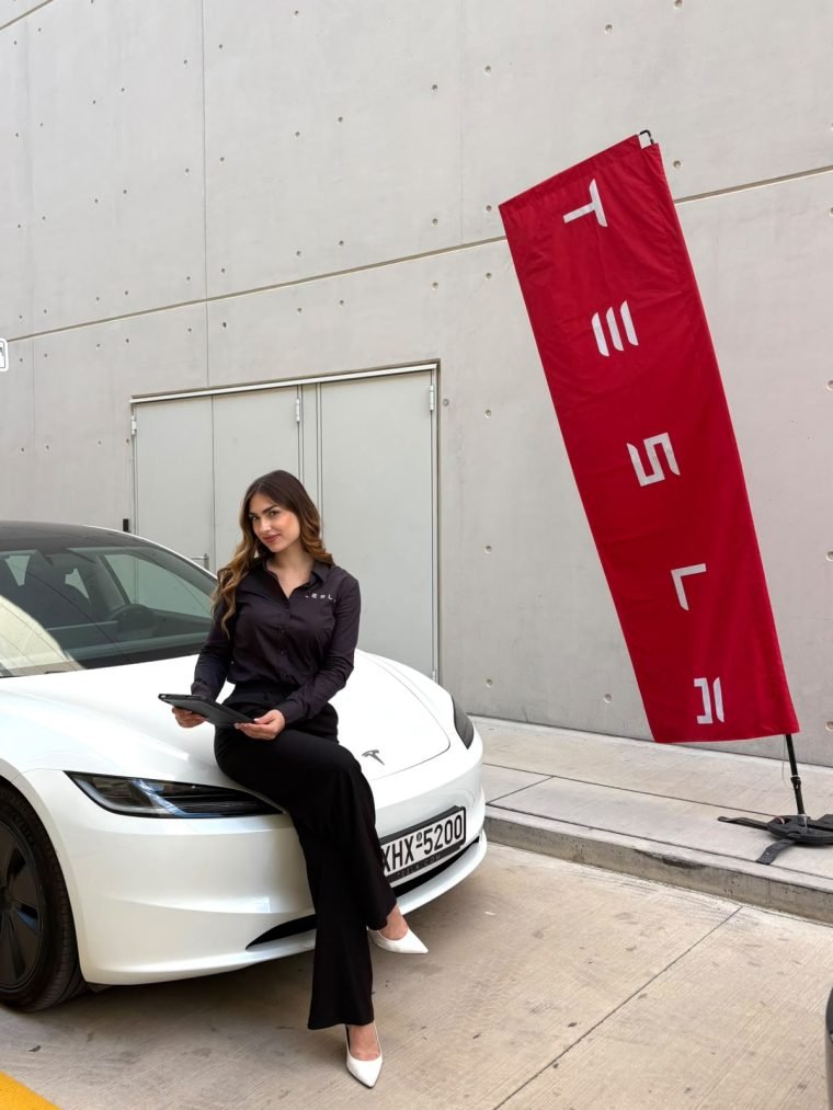 A Tesla outdoor activation with promoters.